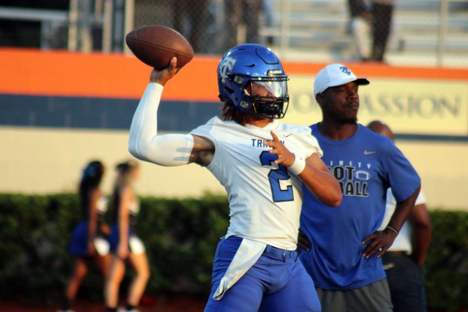 Trinity Christian quarterback Colin Hurley (2) throws a pass in warm-ups before a high school football game at Bolles on September 15, 2023. [Clayton Freeman/Florida Times-Union]