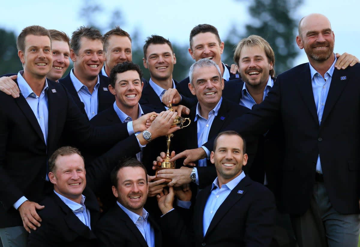 Team Europe pose with the Ryder Cup after their victory over the United States at Gleneagles in 2014 (Lynne Cameron/PA) (PA Archive)