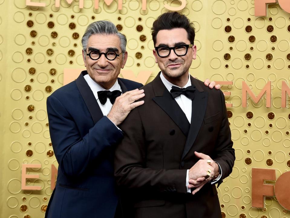 (R-L) Eugene and Dan Levy will make history as the first-ever father-son duo to host the Emmys (AP)