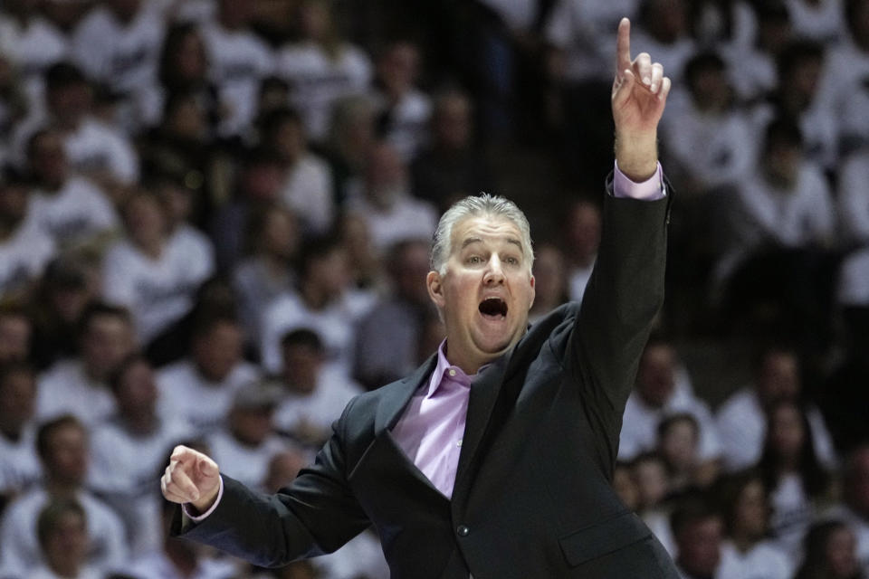 FILE - Purdue head coach Matt Painter gestures on the sideline during the second half of an NCAA college basketball game against Michigan State in West Lafayette, Ind., Sunday, Jan. 29, 2023. Purdue's Matt Painter and Northwestern's Chris Collins split coach of the year honors in the Big Ten in voting released by The Associated Press Tuesday, March 7, 2023. (AP Photo/Michael Conroy)