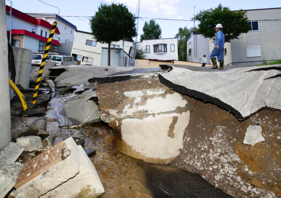 <em>Airports and many roads on the island were closed following the early morning quake (AP)</em>