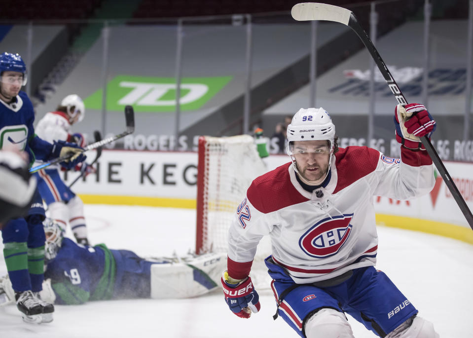 Montreal Canadiens' Jonathan Drouin celebrates his goal against Vancouver Canucks goalie Braden Holtby during the third period of an NHL hockey game Saturday, Jan. 23, 2021, Vancouver, British Columbia. (Darryl Dyck/The Canadian Press via AP)