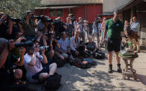 <p>Max, an eagle-owl, is photographed by members of the press while being weighed at the annual weigh-in at London Zoo on August 24, 2016. (Hannah McKay/EPA)</p>