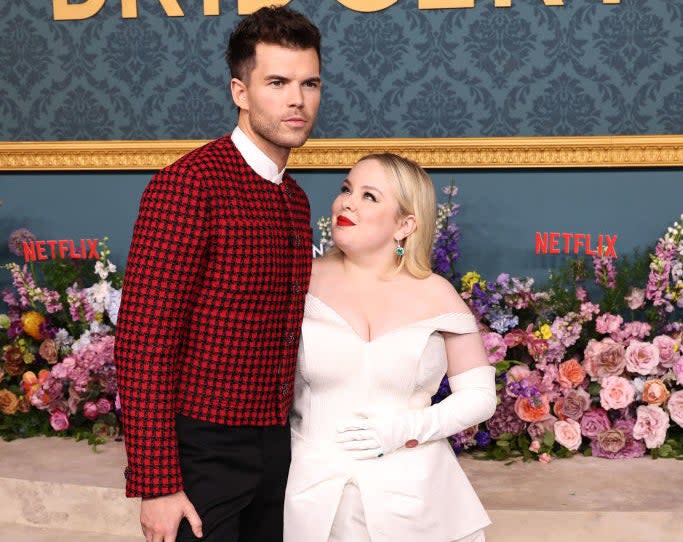 Closeup of Luke Newton and Nicola Coughlan at a "Bridgerton" premiere