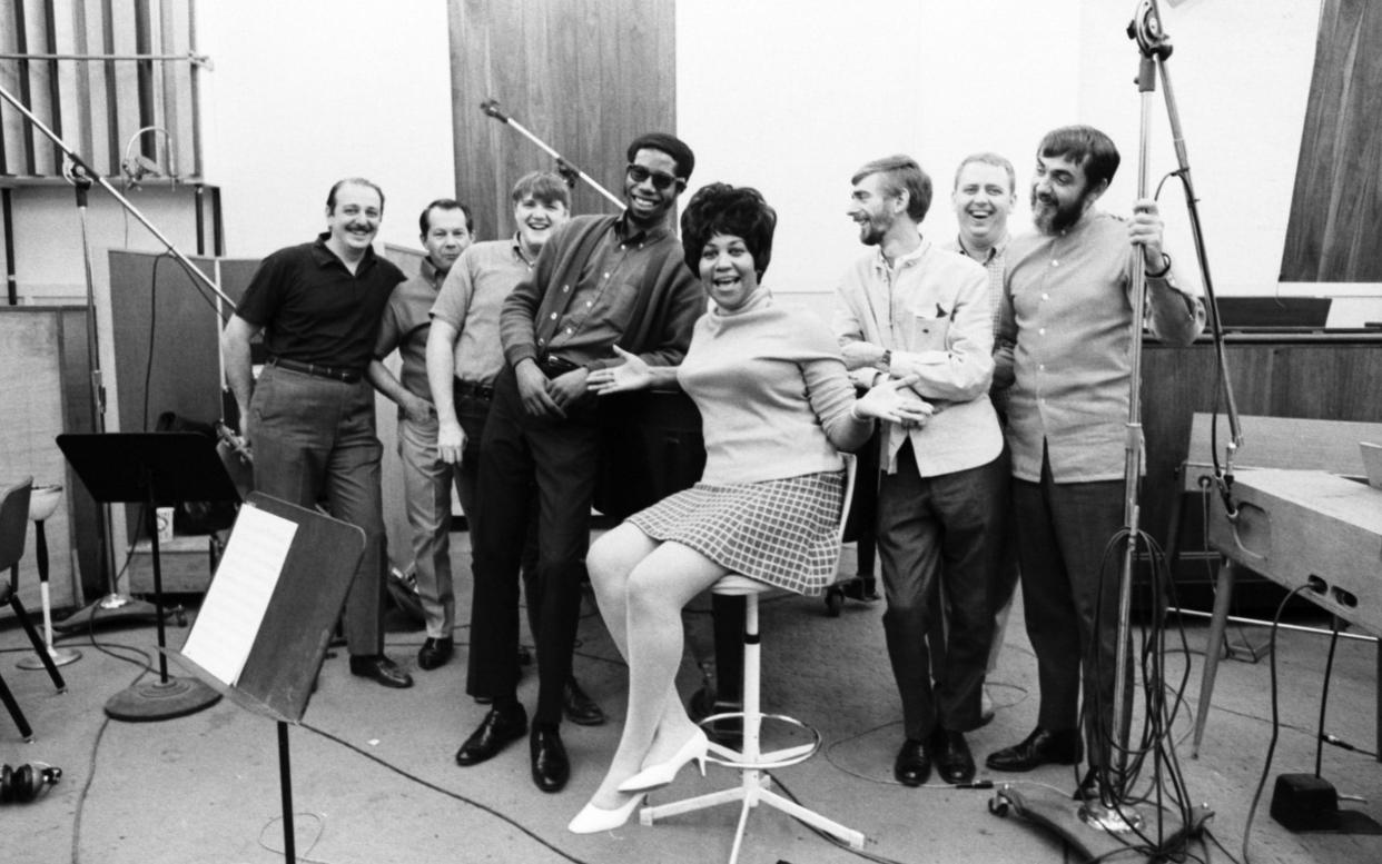 Aretha Franklin and the Muscle Shoals crew in 1968, with Roger Hawkins third from the left - David Gahr/Getty Images