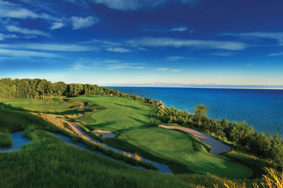 The par-4 first hole on the Links Course at Bay Harbor Golf Club, near Petoskey, featuring picturesque views of Little Traverse Bay. The Links is one of three nine-hole layouts at the club, all designed by Arthur Hills.