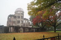 <p>The Hiroshima Peace Memorial, or Genbaku Dome, has been preserved in the same state it was in immediately after the atomic bomb was dropped on Aug. 6, 1945. It is seen here as leaves begin to take on autumn colors, on Nov. 8, 2017. (Photo: Michael Walsh/Yahoo News) </p>