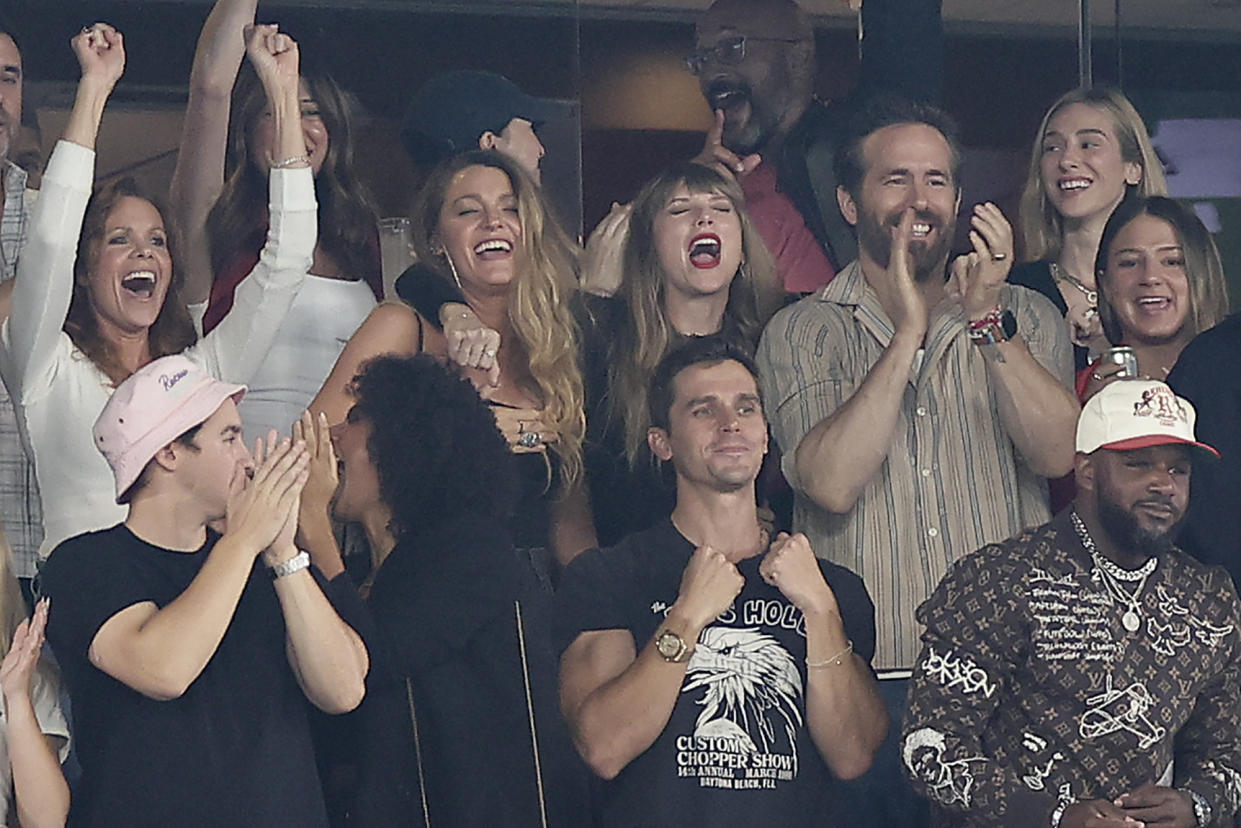 Taylor Swift, top center, Blake Lively, second from left, and Ryan Reynolds, react during an NFL football game between the New York Jets and the Kansas City Chiefs, Sunday, Oct. 1, 2023, in East Rutherford, N.J. (AP Photo/Adam Hunger)