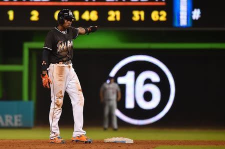 Sep 26, 2016; Miami, FL, USA; Miami Marlins second baseman Dee Gordon leads off in the game against the New York Mets at Marlins Park. Mandatory Credit: Jasen Vinlove-USA TODAY Sports