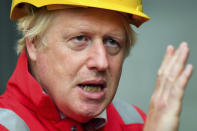 Britain's Prime Minister Boris Johnson gestures, during his visit to Appledore Shipyard in Devon, England, Tuesday, Aug. 25, 2020. (Ben Birchall/PA via AP)