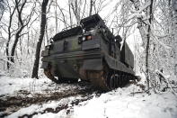 Ukrainian MLRS Multiple Launch Rocket System takes a position in the frontline at an undisclosed location in the Donetsk region, Ukraine, Thursday, Nov. 24, 2022. (AP Photo/Roman Chop)