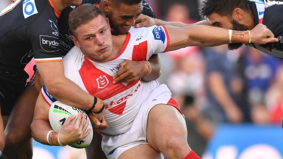 George Burgess of the Dragons is tackled (file image)