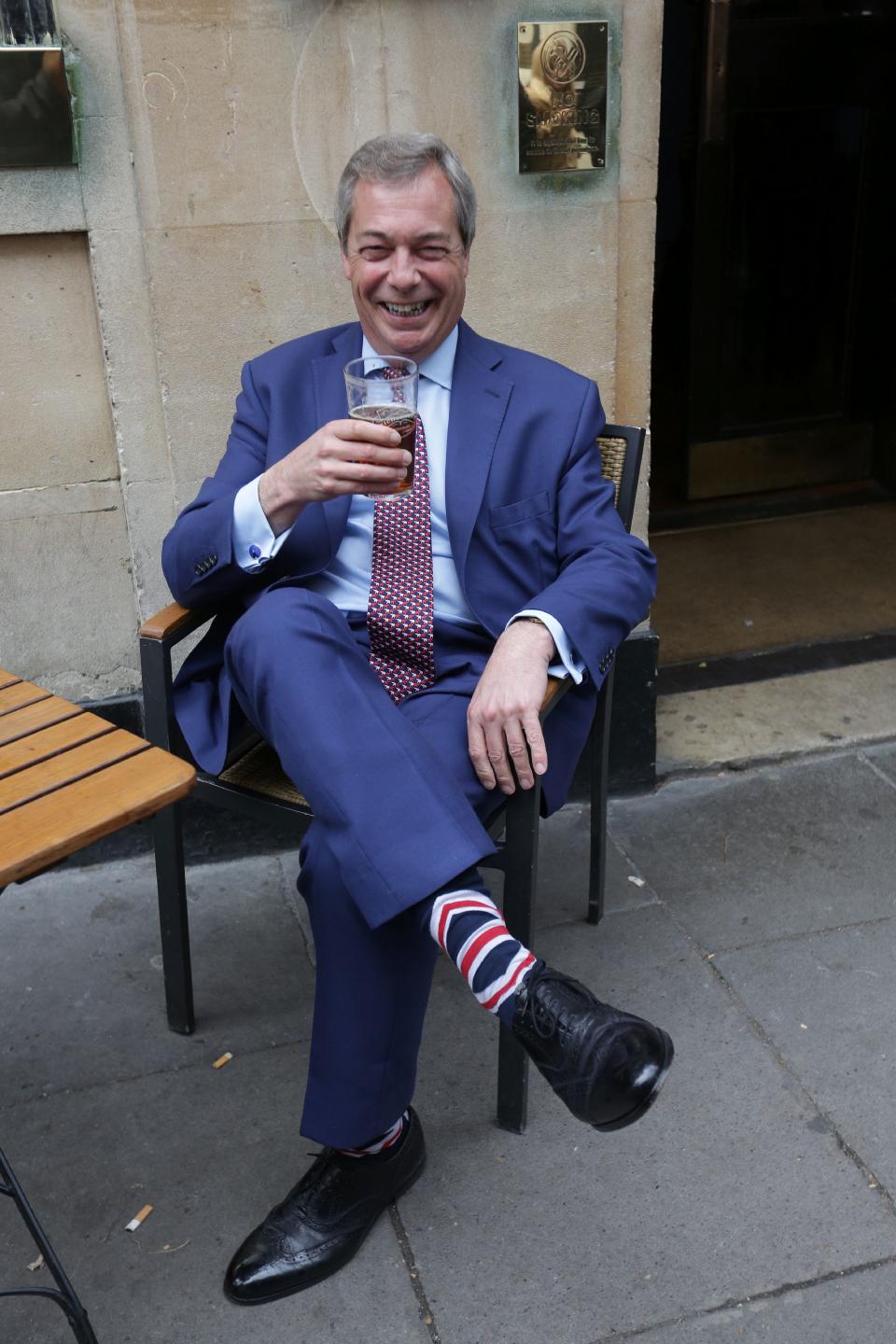 <p>A former leader of the anti-EU UK Independence Party (UKIP), Farage was a major proponent of Brexit and is reportedly a <a rel="nofollow noopener" href="http://www.telegraph.co.uk/news/2017/02/26/nigel-farage-dines-donald-trump-washington/" target="_blank" data-ylk="slk:friend of President Trump's;elm:context_link;itc:0;sec:content-canvas" class="link ">friend of President Trump's</a>. At left he's wearing Union Jack in London on March 29, 2017 following British Prime Minister Theresa May's announcement that Article 50 of the Lisbon Treaty had been triggered, formally starting Britain's withdrawal from the European Union.</p>