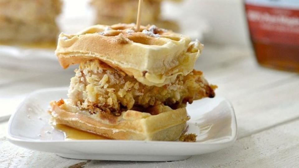 She Knows<p>Try this lightened-up take on the comfort food classic: oven-fried chicken on a four-bite mini waffle sandwiches.</p><p><strong>Get the recipe: <a href="/27254/clairegallamsheknowscom/mini-chicken-and-waffle-sandwiches/" data-ylk="slk:Mini Chicken and Waffle Sandwiches;elm:context_link;itc:0;sec:content-canvas" class="link "><em>Mini Chicken and Waffle Sandwiches</em></a></strong></p>