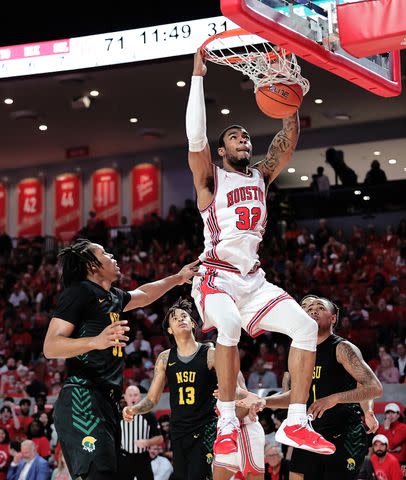 <p>ï»¿Bob Levey/Getty</p> Reggie Chaney #32 of the Houston Cougars dunks against the Norfolk State Spartans at Fertitta Center