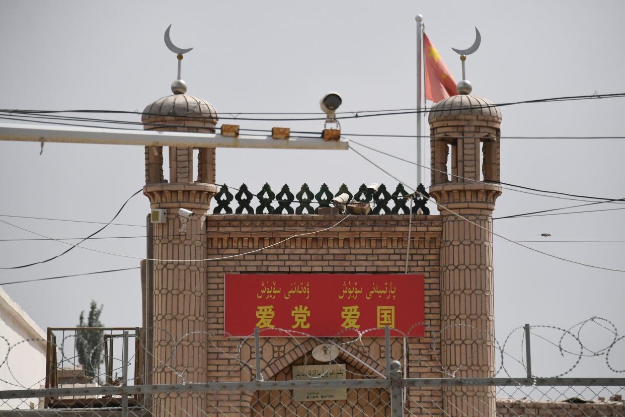 Many mosques have had their features altered to remove Islamic symbols  (AFP via Getty Images)