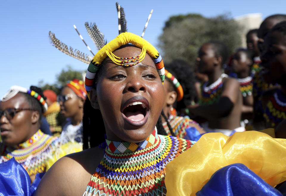 A woman wears traditional headgear and necklace, during King Misuzulu ka Zwelithini coronation, at KwaKhangelamankengane Royal Palace in Nongoma, South Africa. Saturday, Aug. 20, 2022. South Africa’s ethnic Zulu nation hosted a coronation event for its new traditional king amid internal divisions that have threatened to tear the royal family apart. King Misuzulu ka Zwelithini, a son of the late King Goodwill Zwelithini who died from a diabetes-related illness in March last year, will undergo the traditional ritual known as ukungena esibayeni (entering the royal village) to mark his installation as the new leader of the Zulu nation. (AP Photo)