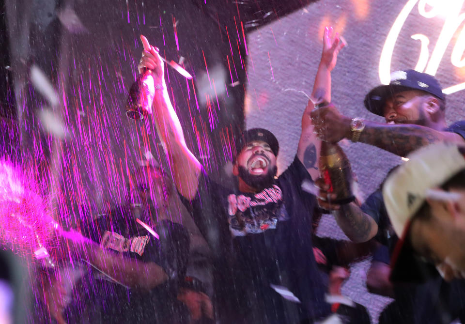 TORONTO, ON- JUNE 13 - Drake celebrates. Toronto fans watch, worry and celebrate at Jurassic park as the Toronto Raptors beat the Golden State Warriors in game six to win the NBA Championship at Oracle Arena in Oakland outside at Scotiabank Arena in Toronto. June 13, 2019. (Steve Russell/Toronto Star via Getty Images)