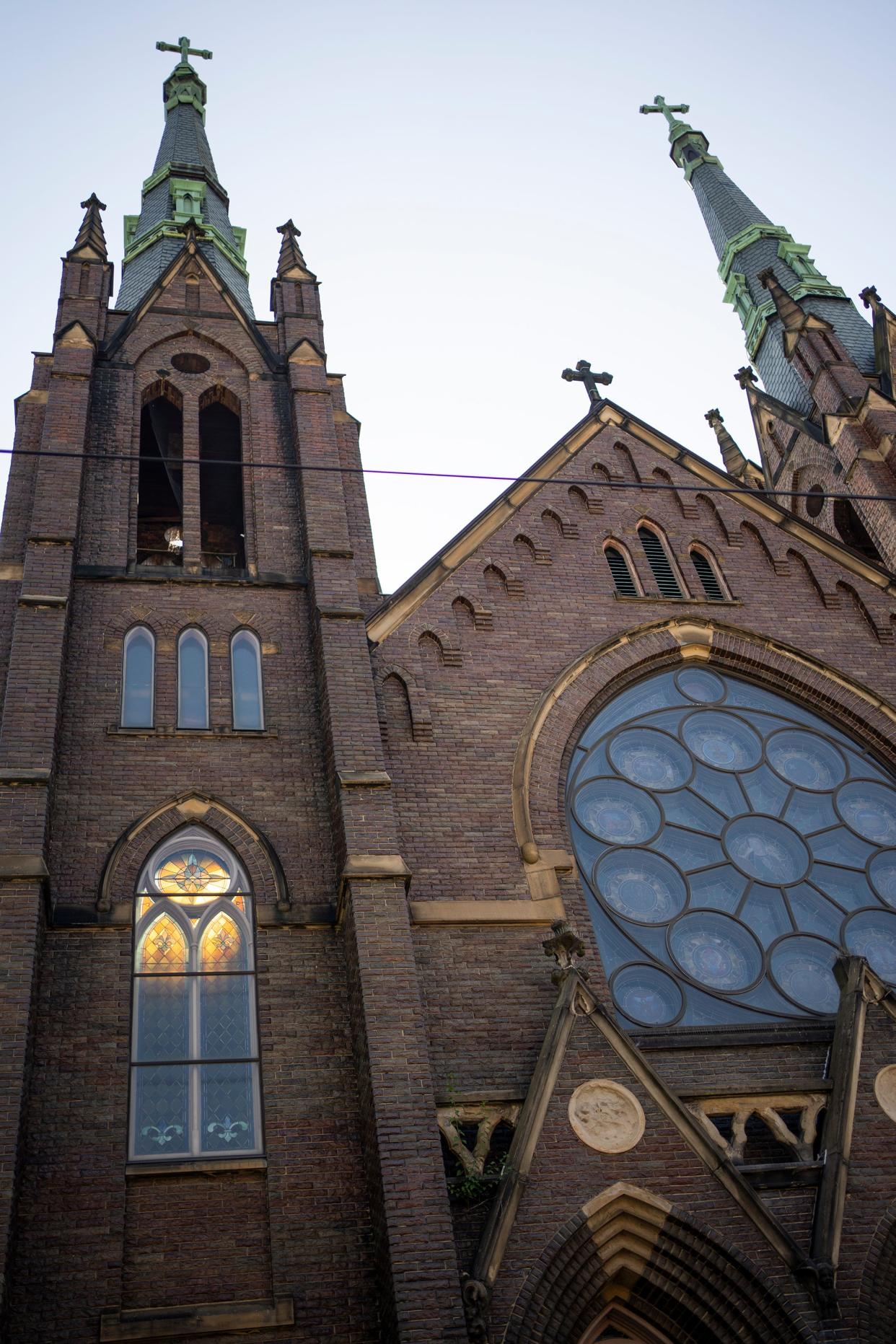 The Catholic Dioceses of Columbus and Steubenville announced Monday that they are in 'preliminary discussions' about a potential merger of the two dioceses. Pictured is Holy Rosary & St. John Catholic Church on Columbus' Near East Side, one of 15 churches the Columbus Diocese announced earlier this year that it was planning to shutter.