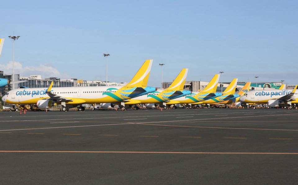 FILE PHOTO: This photo taken on April 19, 2020 shows passenger planes from carrier Cebu Pacific parked on the tarmac of Manila's international airport as air travel to and from the Philippines has been suspended after the government implemented a lockdown in its efforts to contain the spread of COVID-19 disease in the country. (Photo: STR/AFP via Getty Images)