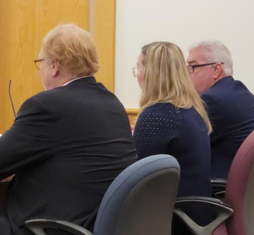 Bridgette Doucette-Howell was sentenced Tuesday at Rockingham Superior Court. She is pictured with lead defense attorney Kurt Olson, left, and co-counsel Timothy Goulden, far right.