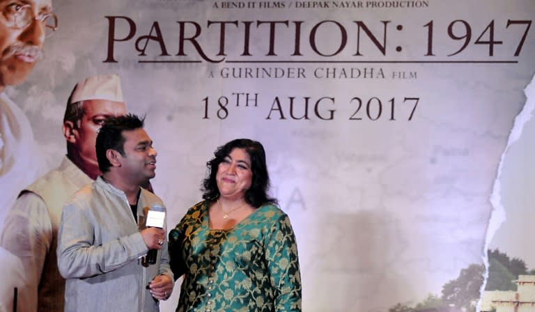 This file photo taken on July 4, 2017 shows Indian film score composer and singer AR Rahman (L) taking part in a promotional event for the forthcoming Hindi film 'Partition 1947' directed by Gurinder Chadha (R) in Mumbai