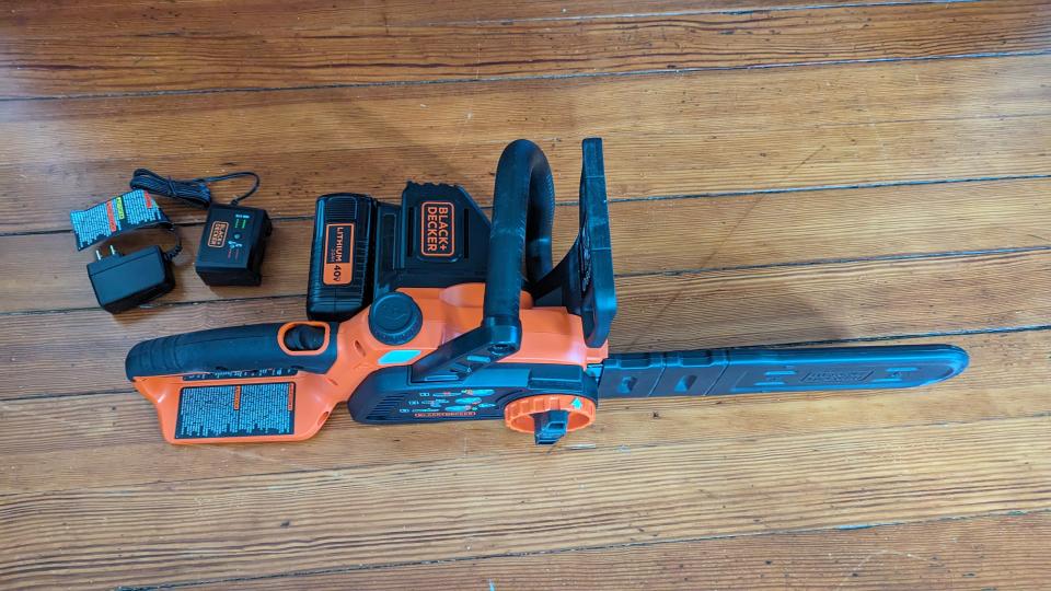 Image of the BLACK + DECKER 40V MAX 12-inch Cordless Chainsaw and associated parts