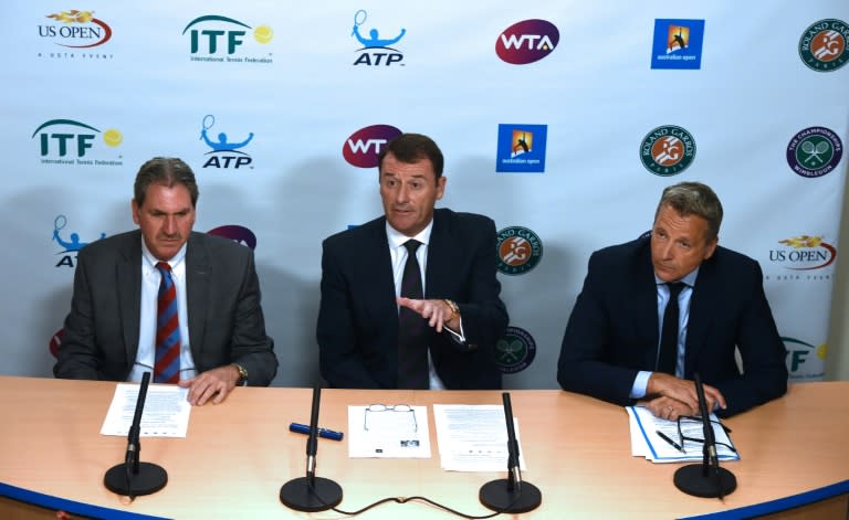 (From L) International Tennis Federation President David Haggerty, Tennis Integrity Board Chairman Philip Brook and Association of Tennis Professionals (ATP) Chairman Chris Kermode address a press conference in Melbourne, on January 27, 2016