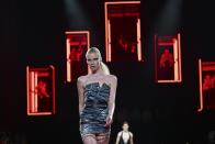 A model wears a creation as part of the DSquared2 Spring Summer 2025 collection, that was presented in Milan, Italy, Friday, June 14, 2024. (AP Photo/Nicola Marfisi).