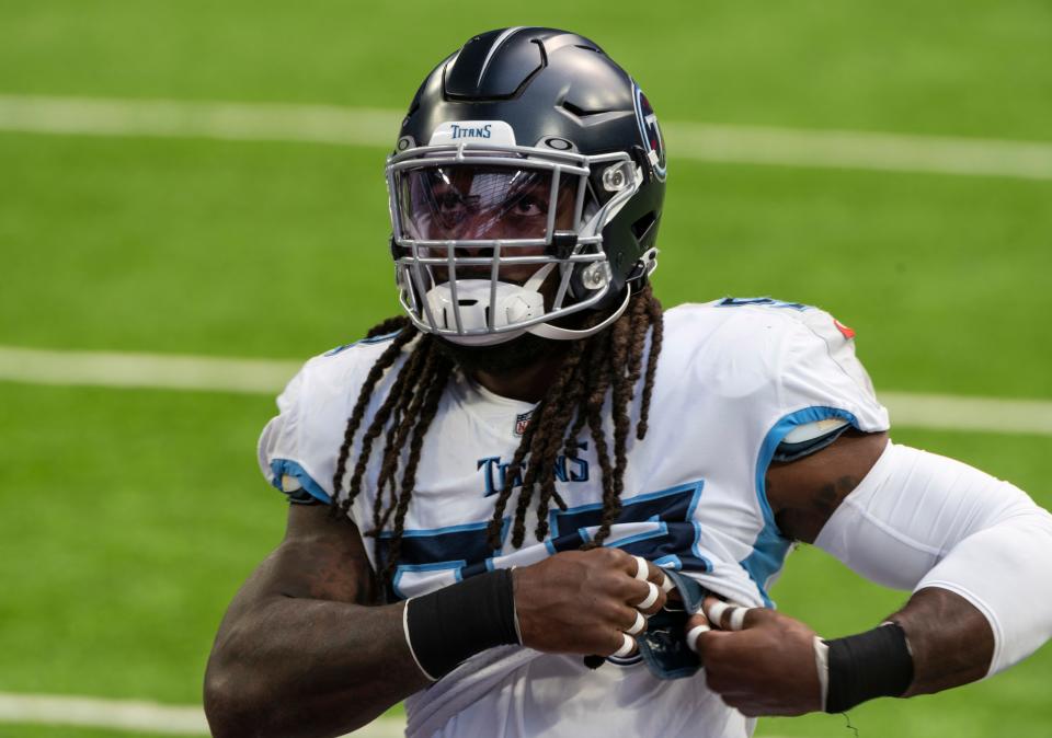 Jadeveon Clowney (99) of the Tennessee Titans warms up before the game against the Minnesota Vikings at U.S. Bank Stadium on September 27, 2020 in Minneapolis, Minnesota.
