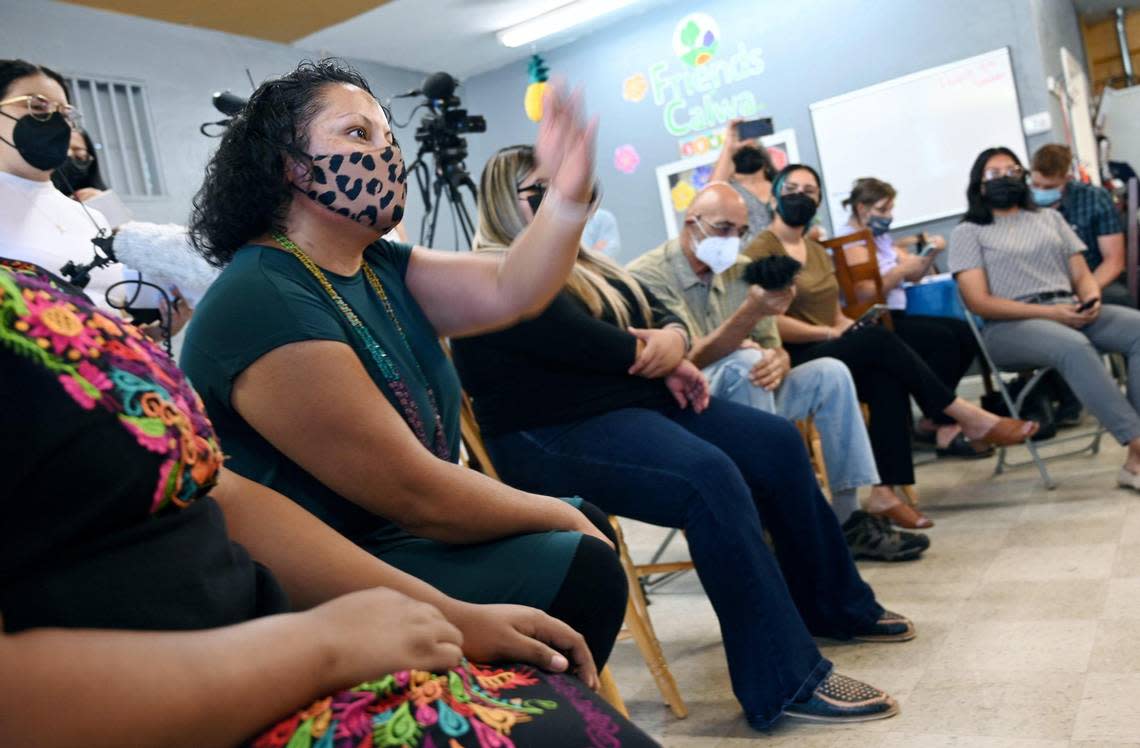 Sandra Celedon, President and CEO of Fresno Building Healthy Communities, left, voices her concerns to California Attorney General Rob Bonta as he listens to environmental justice issues in Fresno County with local organizations and community leaders Tuesday, Aug. 9, 2022 in Fresno.