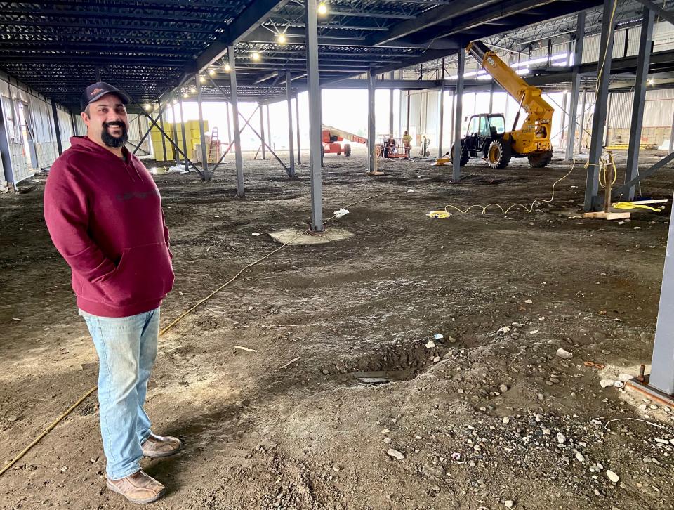 Joseph Estrela stands inside what will be the Silver Stone Castle & Family Entertainment on Route 6 in Swansea.
