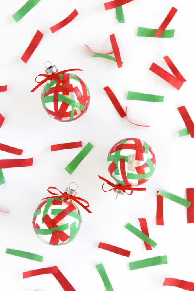 <p>If you've got leftover tissue paper from all your gift wrapping, put it to good use with these ornaments. It's the perfect kid-friendly craft idea, too. Get the tutorial at <a href="https://modpodgerocksblog.com/easy-confetti-diy-christmas-ornaments/" rel="nofollow noopener" target="_blank" data-ylk="slk:Mod Podge Rocks;elm:context_link;itc:0;sec:content-canvas" class="link ">Mod Podge Rocks</a>.</p>