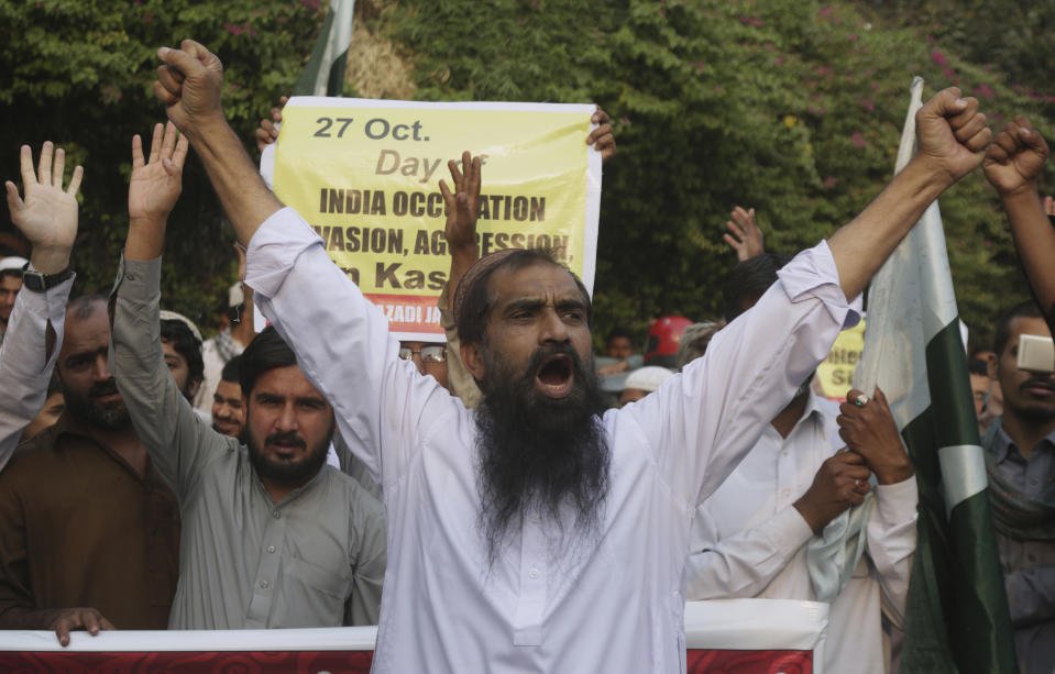 Supporters of Tehreek-Azadi Jammu Kashmir chant slogans during a rally to observe Black Day, in Lahore, Pakistan, Saturday, Oct. 27, 2018. The so called Black Day is being observed Oct. 27, throughout Pakistan to express support and solidarity with Kashmiri people in their peaceful struggle for their right to self-determination. (AP Photo/K.M. Chaudary)