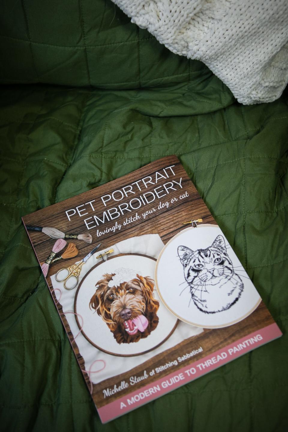 Michelle Staub, of Amelia, aka @StitchingSabbatical, has become well-known throughout social media for her embroidered lifelike pet portraits. She also just had a new book publish on November 15, focused on pet portrait embroidery, full of patterns and how-tos.