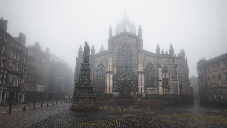 Amelia and Lucas embarked on an Edinburgh ghost tour together, around the city's atmospheric Old Town. Pictured here: the city's gothic St Giles' Cathedral on the Royal Mile, photographed in the fog. - StephenBridger/iStockphoto/Getty Images