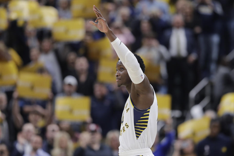 Indiana Pacers star Victor Oladipo waves to the crowd after entering the game during the first half of their matchup against the Chicago Bulls on Wednesday.