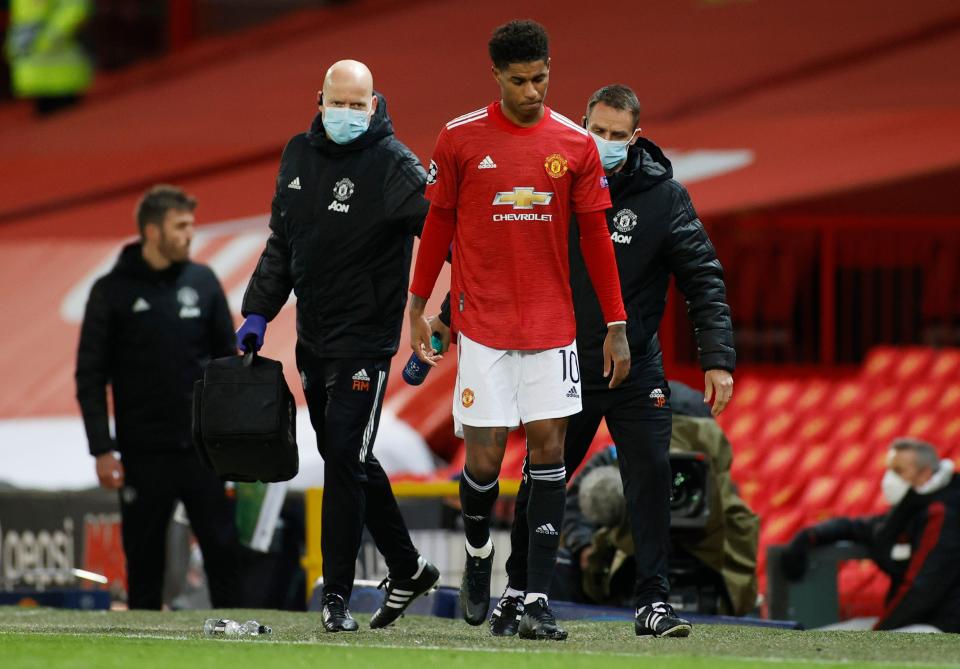 Marcus Rashford leaves the pitch with an injury (Reuters)