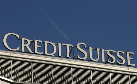 The logo of Swiss bank Credit Suisse is seen on an office building in Zurich May 20, 2014. REUTERS/Arnd Wiegmann