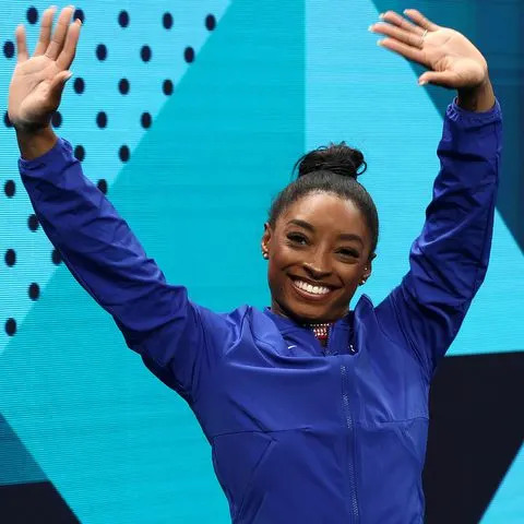 <p>Jamie Squire/Getty</p> Simone Biles