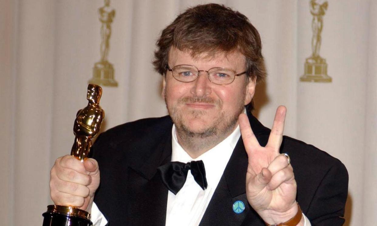 <span>Michael Moore after he received his Oscar for documentary Bowling for Columbine in 2003.</span><span>Photograph: Ian West/PA</span>