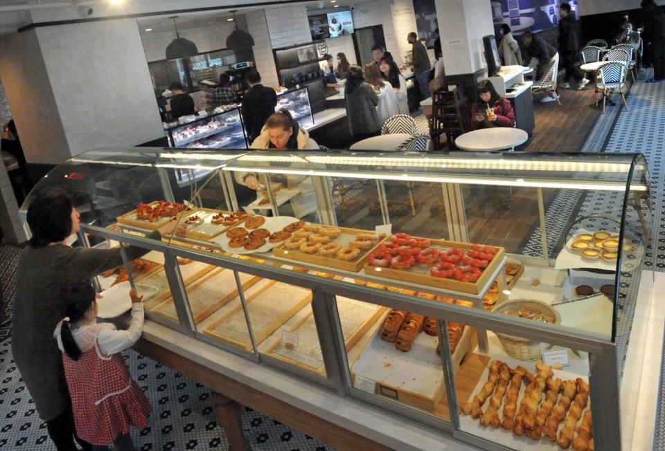 Self-serve pastries are featured at the new Paris Baguette on Hancock Street in North Quincy, Sunday, Dec. 10, 2023.