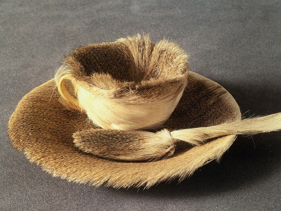 A fur-covered cup, saucer, and  spoon by Swiss artist Meret Oppenheim (1936). / Credit: RDB/ullstein bild via Getty Images