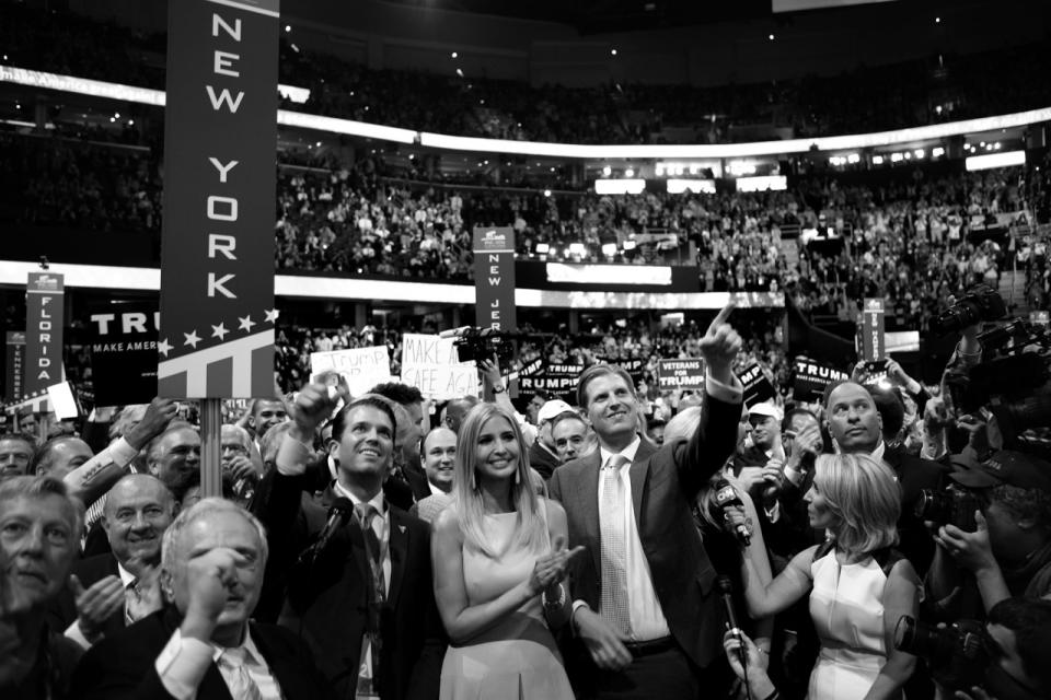 <p>Donald Trump’s children, (L to R) Donald Jr, Ivanka, Eric and Tiffiny celebrate as Donald Jr. announces the delegate count putting their father over the top to clinch the nomination during the RNC Convention in Cleveland, OH on July 19, 2016. (Photo: Khue Bui for Yahoo News)</p>