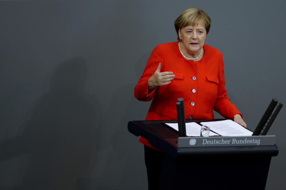 German Chancellor Angela Merkel delivers her speech during a plenary session of the German parliament Bundestag about the budget 2019, in Berlin, Wednesday, Sept. 12, 2018. (AP Photo/Markus Schreiber)