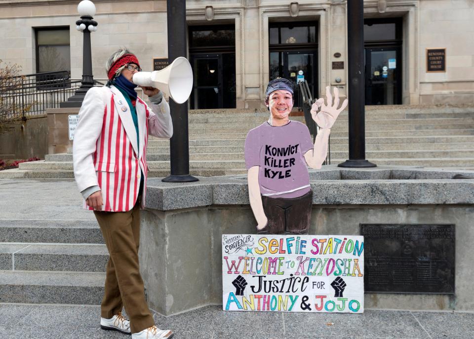 Kenosha resident Bill Gregory sets up his display advocating the conviction of Kyle Rittenhouse at the Kenosha County Courthouse Tuesday, November 16, 2021 in Kenosha, Wis.