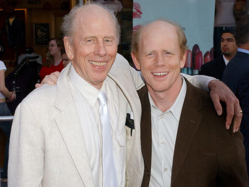 Rance and Ron Howard hugging on a red carpet