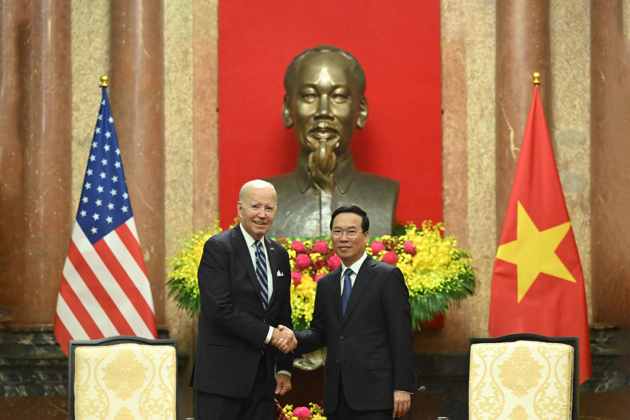 Joe Biden; Vo Van Thuong Saul Loeb/AFP via Getty Images