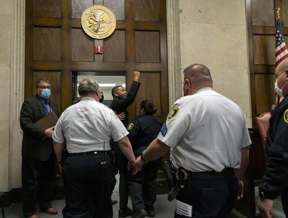 Actor Jussie Smollett is led out of the courtroom after being sentenced at the Leighton Criminal Court Building, Thursday, March 10, 2022, in Chicago. Jussie Smollett maintained his innocence during his sentencing hearing Thursday after a judge sentenced the former “Empire” actor to 150 days in jail for lying to police about a racist and homophobic attack that he orchestrated himself.(Brian Cassella/Chicago Tribune via AP, Pool)