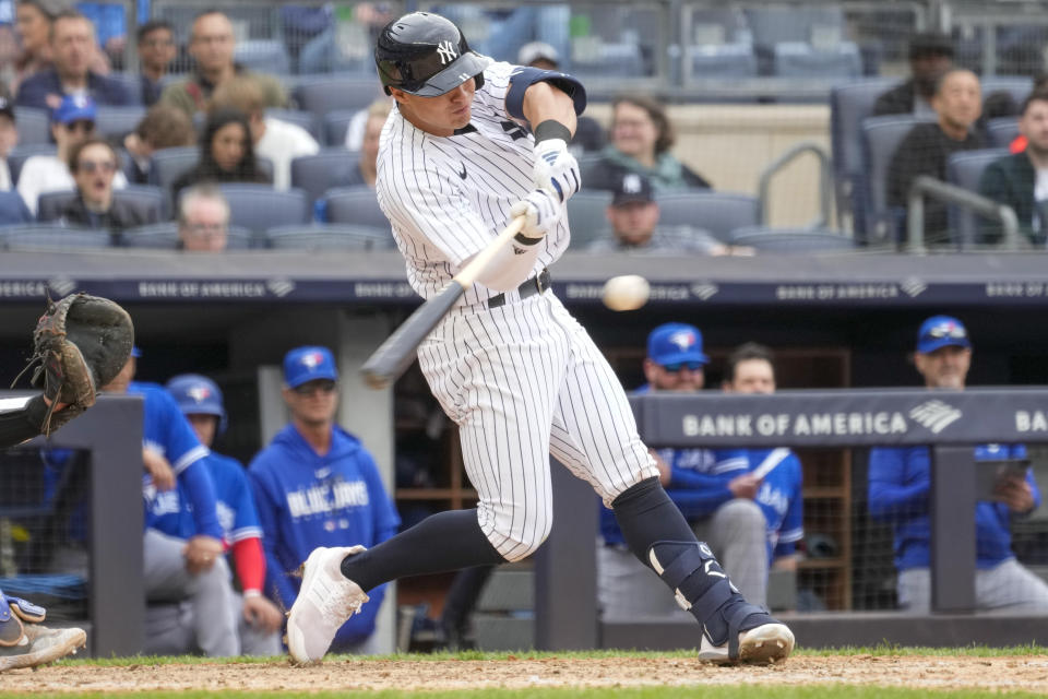 New York Yankees' Anthony Volpe hits a two-run home run in the eighth inning of a baseball game against the Toronto Blue Jays, Saturday, April 22, 2023, in New York. (AP Photo/Mary Altaffer)